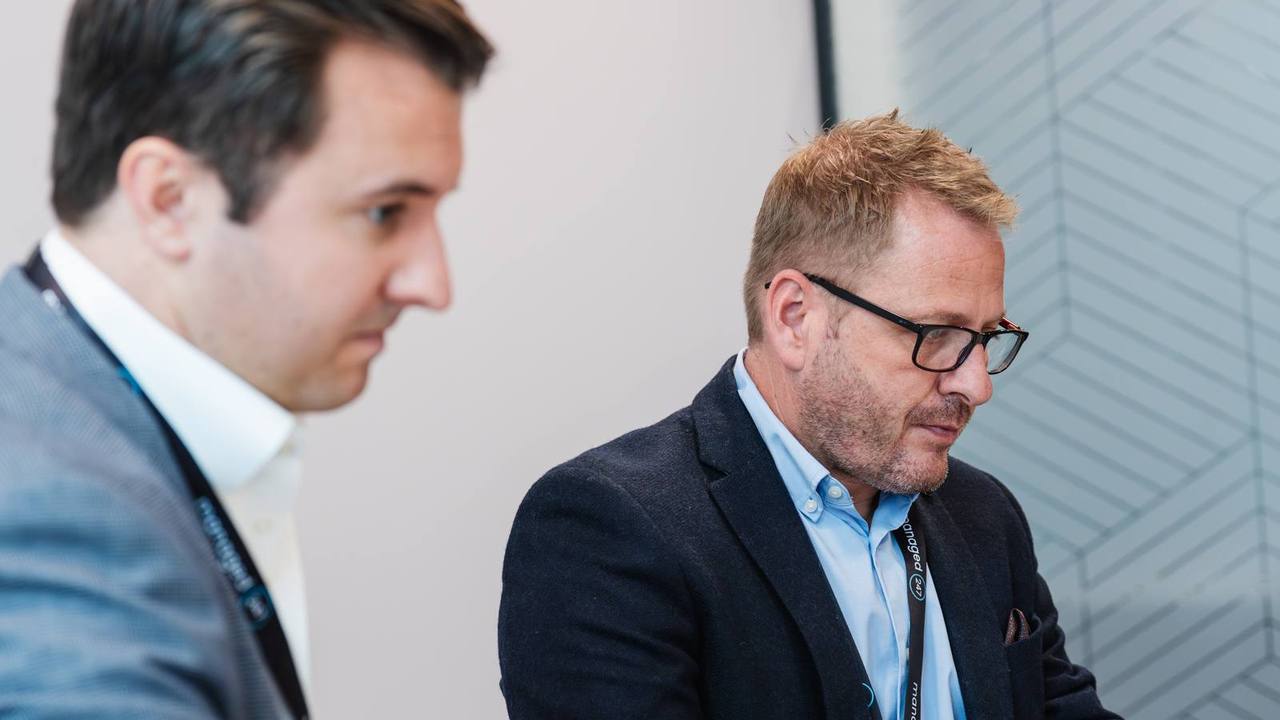 Two channel partners in conversation