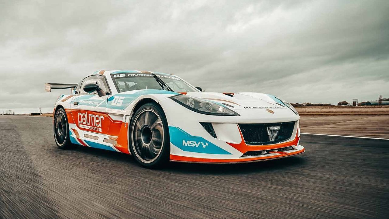 A Palmer Sport Ginetta G56 GTA race car at speed on the track at Bedford Autodrome