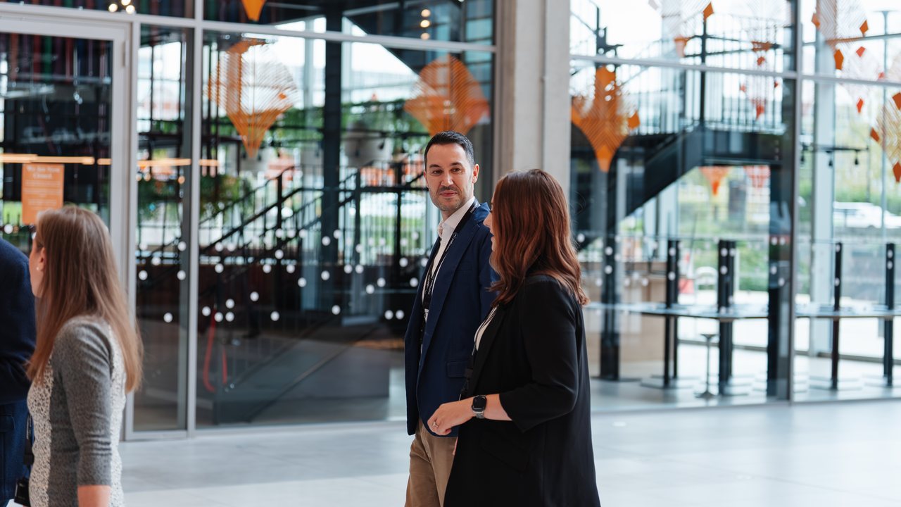 People talking at a Managed247 business event, part of the UK managed service provider supporting businesses across the country