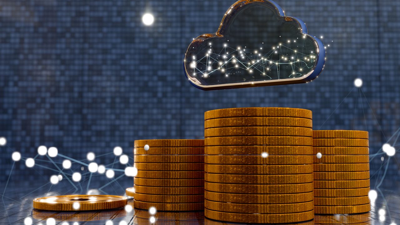 A glowing cloud above stacks of gold coins, representing cloud cost and FinOps