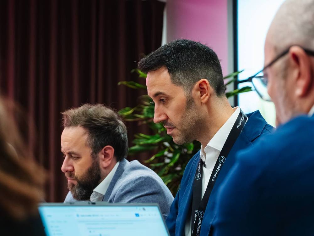 A Managed247 Microsoft Copilot AI planning session in the office